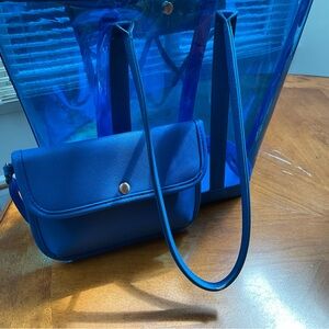 Neiman Marcus stylish blue bag with matching pouch/clutch